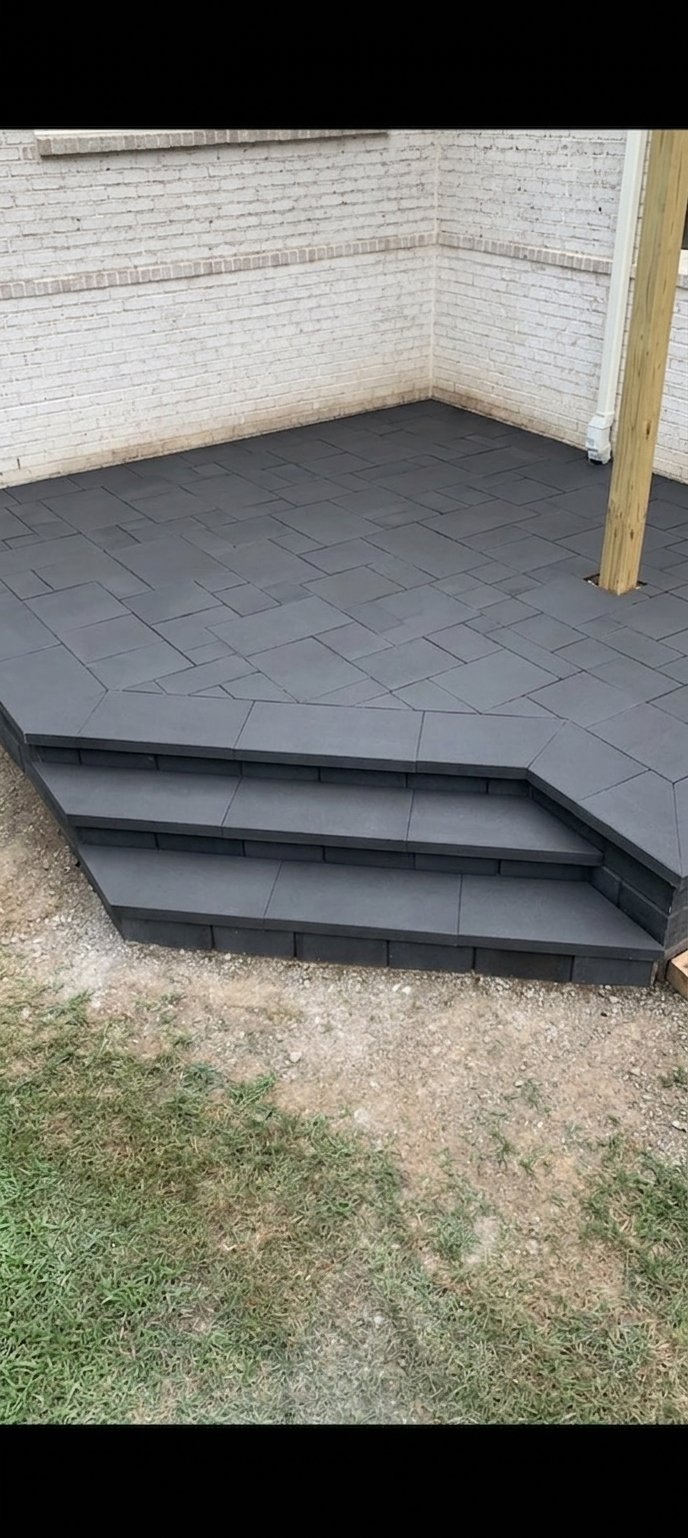 Techo-Bloc paver patio corner with wrap-around steps.